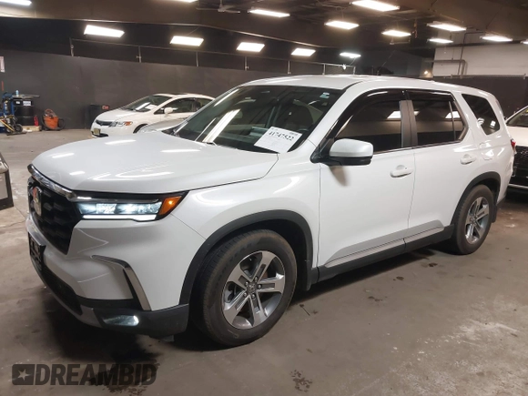 2023 Honda Pilot EX-L z VIN 5FNYG1H5XPB043275, wystawiony jako IAAI lot #41747522 z przebiegiem 18 865 mil mil oraz . Historia ofert i sprzedaży dostępna na DreamBid. Obrazek 19.