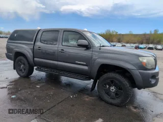 2009 Toyota Tacoma with VIN 3TMLU42N39M024000, listed as a Copart auction lot 55301375 with 210,068 mi miles and Salvage Title. Bid and sale history available at DreamBid. Image 4.