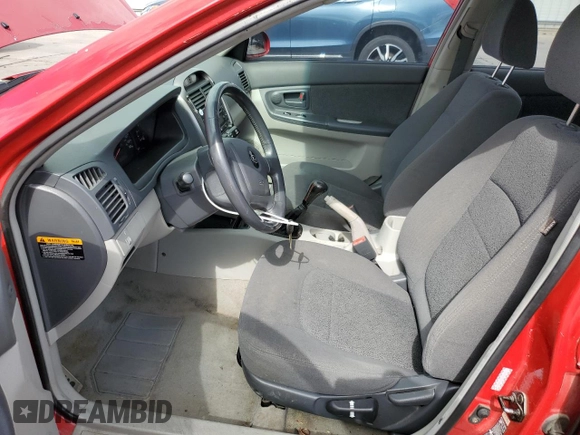 2005 Kia Spectra with VIN KNAFE161455072263, listed as a Copart auction lot 50353204 with 179,957 mi miles and Salvage Title. Bid and sale history available at DreamBid. Image 7.