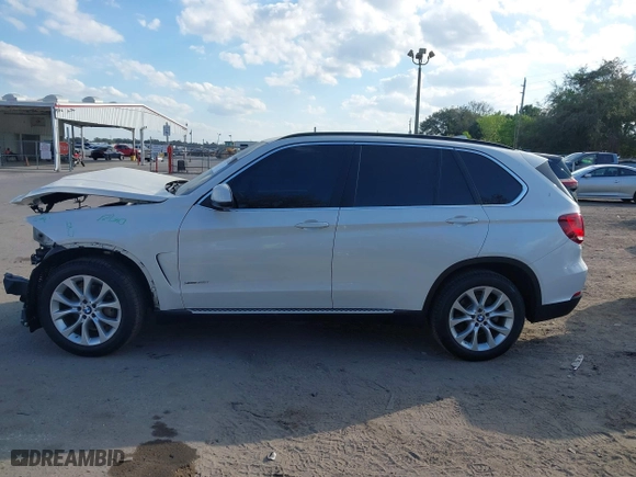 2016 BMW X5 xDrive35i with VIN 5UXKR0C54G0P27141, listed as a IAAI auction lot 41553602 with 61,947 mi miles. Bid and sale history available at carsss.com. Image 15.