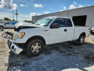 2011 Ford F-150 XL with VIN 1FTEX1CM5BFB48134, listed as a Copart auction lot 63298945 with 218,595 mi miles and Salvage title. Bid and sale history available at DreamBid. Image 1.
