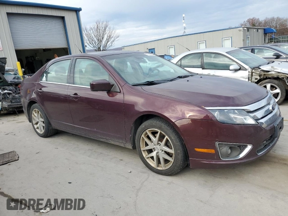 2012 Ford Fusion SEL with VIN 3FAHP0JA8CR424770, listed as a Copart auction lot 44046345 with 218,408 mi miles and Salvage title. Bid and sale history available at DreamBid. Image 4.