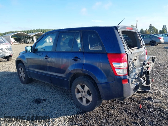 2012 Suzuki Grand Vitara Premium z VIN JS3TD0D63C4100625, wystawiony jako IAAI lot #40462478 z przebiegiem 116 027 mil mil oraz . Historia ofert i sprzedaży dostępna na DreamBid. Obrazek 3.