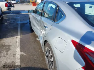 2018 Nissan Altima 2.5 SV with VIN 1N4AL3APXJC265944, listed as a IAAI auction lot 41052902 with 142,023 mi miles. Bid and sale history available at carsss.com. Image 18.