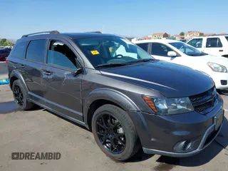 2014 Dodge Journey SXT z VIN 3C4PDCBG8ET218406, wystawiony jako IAAI lot #42299247 z przebiegiem 112 517 mil mil oraz . Historia ofert i sprzedaży dostępna na DreamBid. Obrazek 1.
