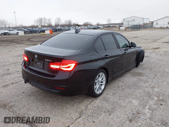 2018 BMW 3 Series 320i with VIN WBA8E1G56JNU91008, listed as a IAAI auction lot 41247490 with 57,434 mi miles. Bid and sale history available at carsss.com. Image 4.
