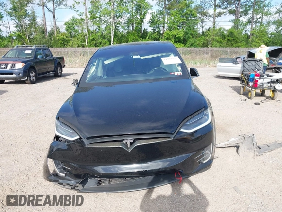 2016 Tesla Model X 70D z VIN 5YJXCAE29GF003478, wystawiony jako IAAI lot #41965737 z przebiegiem 105 930 mil mil oraz . Historia ofert i sprzedaży dostępna na DreamBid. Obrazek 12.