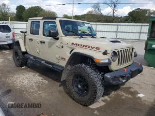 2020 Jeep Gladiator Mojave z VIN 1C6JJTEG9LL208154, wystawiony jako Copart lot #70474844 z przebiegiem 31 065 mil mil oraz Szkoda całkowita • Salvage title. Historia ofert i sprzedaży dostępna na DreamBid. Obrazek 4.