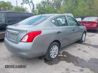 2012 Nissan Versa SV with VIN 3N1CN7APXCL825492, listed as a IAAI auction lot 42052119 with 130,300 mi miles. Bid and sale history available at carsss.com. Image 4.