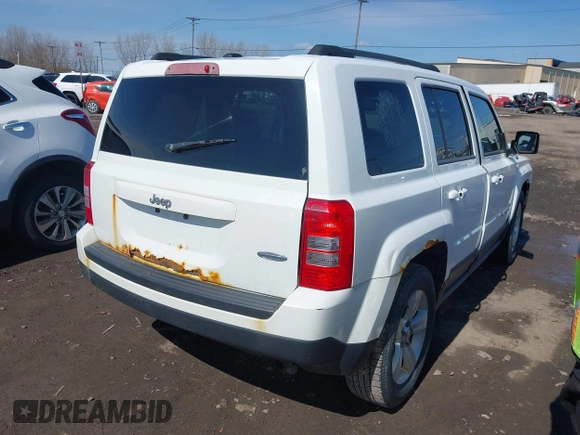 2014 Jeep Patriot Latitude with VIN 1C4NJPFA8ED550221, listed as a IAAI auction lot 41919419 with 185,386 mi miles and . Bid and sale history available at carsss.com. Image 4.
