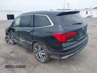 2017 Honda Pilot Touring with VIN 5FNYF6H90HB052474, listed as a IAAI auction lot 42291464 with 103,288 mi miles and . Bid and sale history available at DreamBid. Image 3.