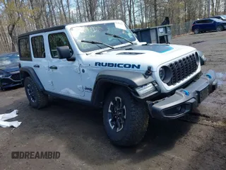 2024 Jeep Wrangler Rubicon with VIN 1C4RJXR61RW232315, listed as a IAAI auction lot 41979237 with 34,174 mi miles and . Bid and sale history available at DreamBid. Image 1.