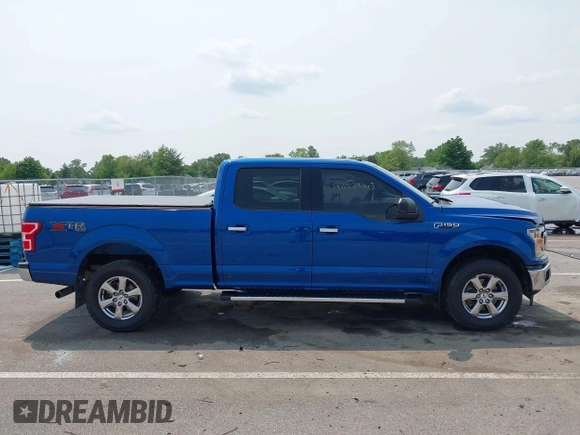 2018 Ford F-150 XL with VIN 1FTFW1E56JKF46021, listed as a IAAI auction lot 42469363 with 85,243 mi miles and . Bid and sale history available at DreamBid. Image 13.