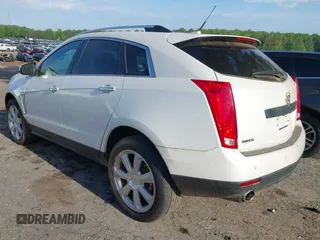 2014 Cadillac SRX Performance Collection with VIN 3GYFNCE36ES662689, listed as a IAAI auction lot 42109417 with 132,957 mi miles. Bid and sale history available at carsss.com. Image 3.