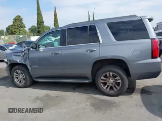 2018 Chevrolet Tahoe LS with VIN 1GNSCAEC2JR306131, listed as a IAAI auction lot 42338873 with 107,652 mi miles and . Bid and sale history available at DreamBid. Image 14.