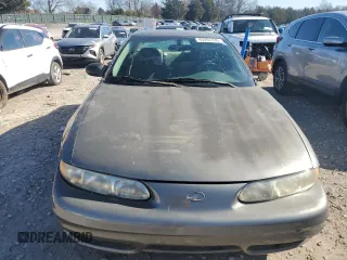2003 Oldsmobile Alero GL1 z VIN 1G3NL52F33C278485, wystawiony jako Copart lot #45201535 z przebiegiem 196 190 mil mil oraz Szkoda całkowita • Salvage title. Historia ofert i sprzedaży dostępna na DreamBid. Obrazek 5.