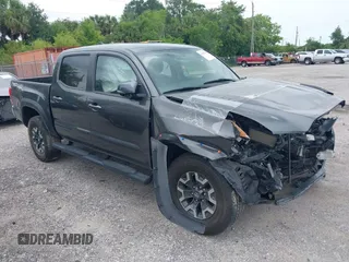 2017 Toyota Tacoma SR5 z VIN 3TMCZ5AN1HM120411, wystawiony jako IAAI lot #41457008 z przebiegiem 75 062 mil mil oraz . Historia ofert i sprzedaży dostępna na DreamBid. Obrazek 1.