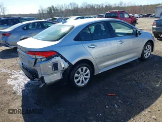 2023 Toyota Corolla Hybrid LE with VIN JTDBCMFE1P3015786, listed as a IAAI auction lot 41887102 with 27,123 mi miles. Bid and sale history available at carsss.com. Image 4.