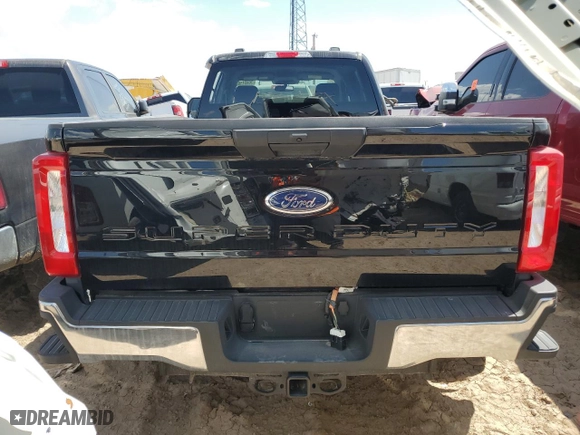 2023 Ford Super Duty F-350 DRW XL with VIN 1FT8W3DT8PEC37596, listed as a Copart auction lot 76451103 with 20,029 mi miles and Salvage Title. Bid and sale history available at carsss.com. Image 6.