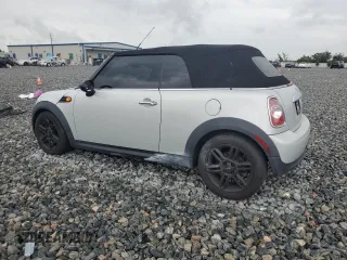 2013 MINI Convertible with VIN WMWZN3C52DT569306, listed as a Copart auction lot 56594535 with 80,247 mi miles and Clean title. Bid and sale history available at DreamBid. Image 2.
