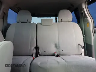 2014 Toyota Sienna L with VIN 5TDZK3DC1ES486586, listed as a Copart auction lot 84680574 with 122,332 mi miles and Salvage Title. Bid and sale history available at carsss.com. Image 10.