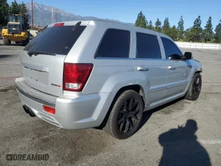 2007 Jeep Grand Cherokee SRT-8 with VIN 1J8HR78327C662597, listed as a Copart auction lot 85585864 with 184,430 mi miles and Salvage Title. Bid and sale history available at carsss.com. Image 3.