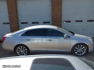 2013 Cadillac XTS Luxury with VIN 2G61P5S38D9180721, listed as a IAAI auction lot 41837476 with 132,222 mi miles. Bid and sale history available at carsss.com. Image 13.