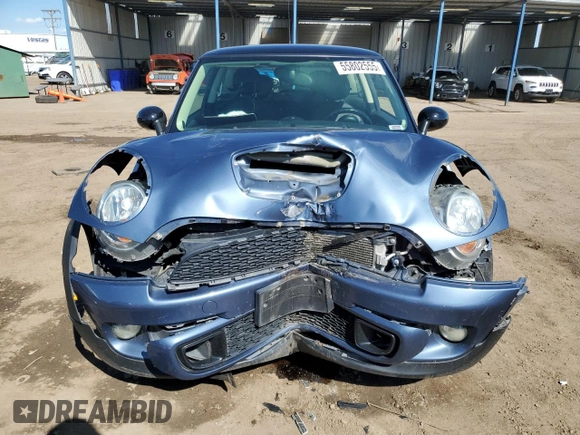 2011 MINI Hardtop S with VIN WMWSV3C57BTY13899, listed as a Copart auction lot 55802555 with 73,012 mi miles and Salvage title. Bid and sale history available at DreamBid. Image 5.