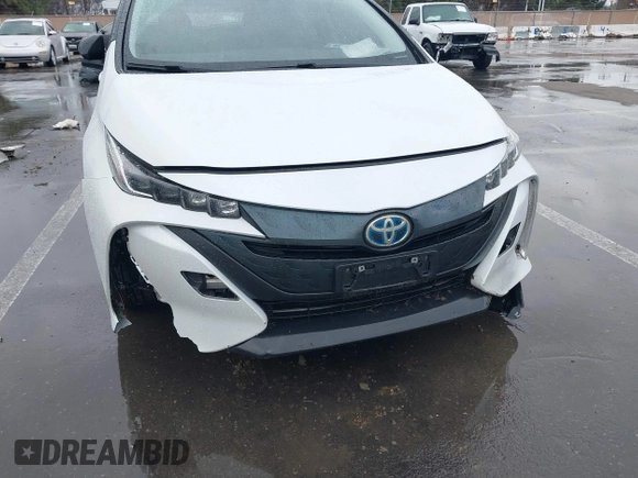 2021 Toyota Prius LE with VIN JTDKAMFP0M3169019, listed as a IAAI auction lot 41481098 with 84,304 mi miles and . Bid and sale history available at DreamBid. Image 6.