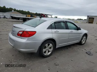 2010 Chrysler Sebring Limited with VIN 1C3CC5FD2AN194728, listed as a Copart auction lot 74457124 with 90,556 mi miles and Salvage title. Bid and sale history available at DreamBid. Image 3.