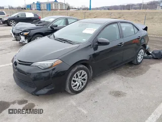 2019 Toyota Corolla L with VIN 5YFBURHE5KP945925, listed as a IAAI auction lot 41493079 with 96,849 mi miles and . Bid and sale history available at carsss.com. Image 18.