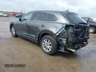 2016 Mazda CX-9 Sport with VIN JM3TCABY5G0122478, listed as a IAAI auction lot 42115795 with 134,980 mi miles and . Bid and sale history available at DreamBid. Image 3.