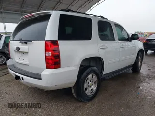 2013 Chevrolet Tahoe LS with VIN 1GNSCAE05DR276326, listed as a IAAI auction lot 41894489 with 173,183 mi miles and . Bid and sale history available at DreamBid. Image 4.