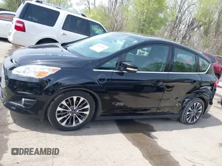 2017 Ford C-Max Energi Titanium with VIN 1FADP5FU2HL115199, listed as a IAAI auction lot 42001944 with 57,609 mi miles. Bid and sale history available at carsss.com. Image 14.