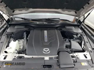 2025 Mazda CX-90 Premium Plus z VIN JM3KKEHA4S1208142, wystawiony jako Copart lot #56283165 z przebiegiem 1581 mil mil oraz Szkody całkowita. Historia ofert i sprzedaży dostępna na DreamBid. Obrazek 12.