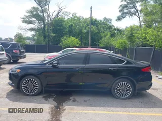 2017 Ford Fusion Titanium with VIN 3FA6P0D92HR252476, listed as a IAAI auction lot 40176942 with 88,818 mi miles and . Bid and sale history available at DreamBid. Image 14.