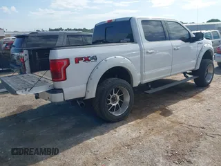 2015 Ford F-150 XLT with VIN 1FTEW1EG0FKD35742, listed as a IAAI auction lot 42563552 with 179,814 mi miles and . Bid and sale history available at DreamBid. Image 4.