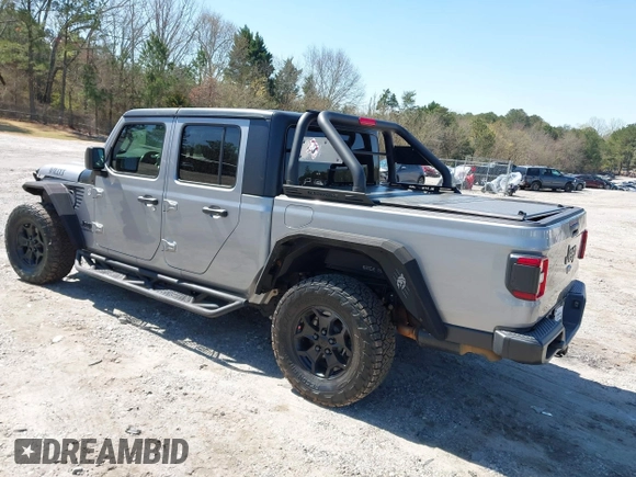 2021 Jeep Gladiator Freedom with VIN 1C6HJTAG3ML540967, listed as a IAAI auction lot 41883858 with 92,287 mi miles and . Bid and sale history available at DreamBid. Image 3.