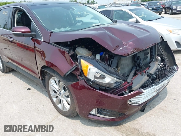 2019 Ford Edge Titanium with VIN 2FMPK4K96KBB20247, listed as a IAAI auction lot 42450212 with 121,756 mi miles and . Bid and sale history available at DreamBid. Image 6.
