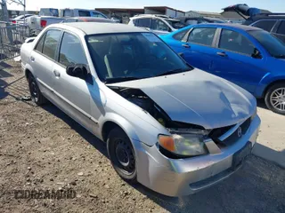 2001 Mazda Protege DX with VIN JM1BJ222810410482, listed as a IAAI auction lot 40799727 with 159,446 mi miles and . Bid and sale history available at DreamBid. Image 1.