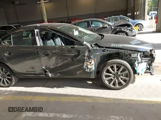 2023 Mazda 3 S Premium with VIN 3MZBPBDM5PM374492, listed as a IAAI auction lot 42025207 with 12,344 mi miles and . Bid and sale history available at DreamBid. Image 14.