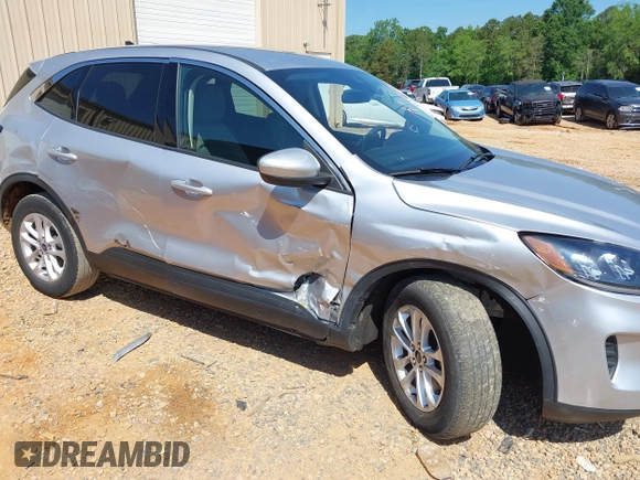 2020 Ford Escape SE with VIN 1FMCU0G6XLUC54979, listed as a IAAI auction lot 42223043 with 52,770 mi miles and . Bid and sale history available at DreamBid. Image 6.