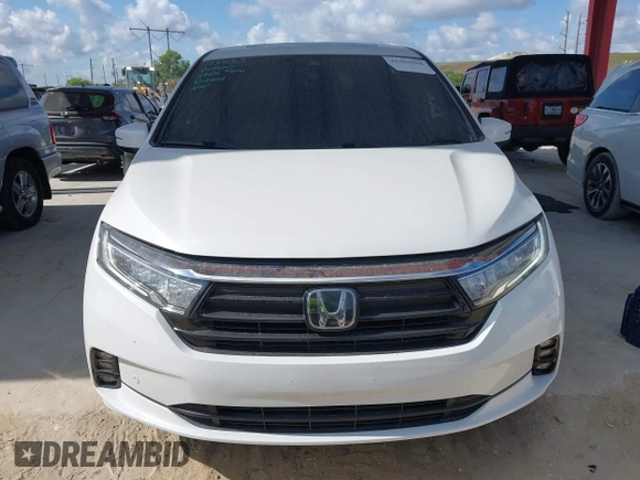 2021 Honda Odyssey Touring z VIN 5FNRL6H80MB003323, wystawiony jako IAAI lot #42303968 z przebiegiem 51 531 mil mil oraz . Historia ofert i sprzedaży dostępna na DreamBid. Obrazek 13.