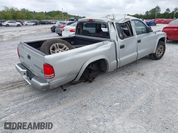 2003 Dodge Dakota SLT with VIN 1D7HL48N13S274856, listed as a IAAI auction lot 41954038 with 306,728 mi miles. Bid and sale history available at carsss.com. Image 4.