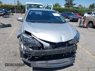 2019 Toyota Corolla L with VIN 2T1BURHE7KC139228, listed as a IAAI auction lot 42243979 with 106,008 mi miles and . Bid and sale history available at DreamBid. Image 13.