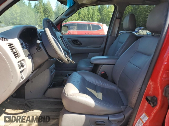 2002 Ford Escape XLT Choice with VIN 1FMCU04122KB12659, listed as a Copart auction lot 63816155 with 256,536 mi miles and Salvage title. Bid and sale history available at DreamBid. Image 7.