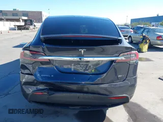 2016 Tesla Model X 70D with VIN 5YJXCBE24GF019450, listed as a IAAI auction lot 41517321 with 96,831 mi miles. Bid and sale history available at carsss.com. Image 16.