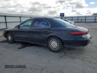 1997 Mercury Sable GS z VIN 1MELM50U1VA620597, wystawiony jako Copart lot #51635765 z przebiegiem 250 824 mil mil oraz Szkoda całkowita • Salvage title. Historia ofert i sprzedaży dostępna na DreamBid. Obrazek 2.