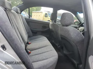 2001 Hyundai Elantra GLS with VIN KMHDN45D01U241519, listed as a Copart auction lot 61551095 with 201,343 mi miles and Salvage title. Bid and sale history available at DreamBid. Image 10.