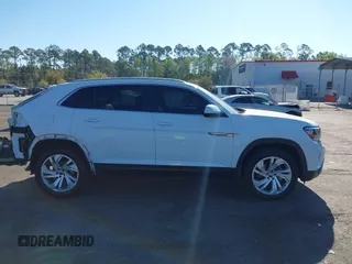 2021 Volkswagen Atlas SEL z VIN 1V2EE2CA2MC227667, wystawiony jako IAAI lot #41886405 z przebiegiem 41 928 mil mil oraz . Historia ofert i sprzedaży dostępna na DreamBid. Obrazek 14.